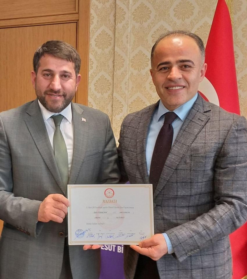 İSA TÜRKCAN  MAZBATASINI ALDI